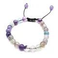 Detailed view of 8mm natural fluorite beads on a brown hand-woven adjustable cord. - Colorful Fluorite