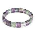 Close-up of a square faceted natural fluorite crystal bead bracelet on white background - Colorful Fluorite