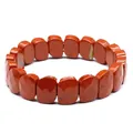 Detail macro view of faceted red jasper stone plate bracelet with natural textures - Red Jasper
