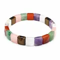 Close-up of faceted square natural stone beads in a colorful stretch bracelet - Rainbow
