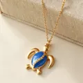 Stainless steel gold-plated necklace with a blue sea turtle pendant - 3*2.4 cm / Royal Blue (MA01-7)