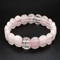 Detailed close-up of a natural pink rose quartz stone hand plate style bracelet - Rose Quartz