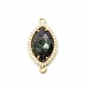 Vista macro dettagliata del connettore in pietra naturale marquise con pavé CZ per gioielli DIY - Rubino Zoisite