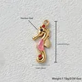 Gold-plated stainless steel seahorse pendant with pink inlay and red zircon accents - 2.45x1cm / Deep Pink Seahorse