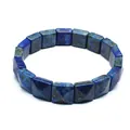 Detailed view of faceted square natural blue lapis lazuli stone beads on a bracelet - Lapis Lazuli