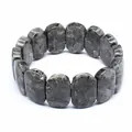 Detailed view of natural gray labradorite stone slab bracelet with unique textures. - Larvikite