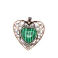 Detailed view of vintage openwork heart pendant with green malachite pattern stone - Malachite