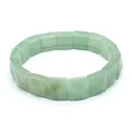 Close-up view of faceted square green natural stone beads on a stretch elastic bracelet - Aventurine Jade
