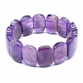 Macro view showing the natural texture of polished purple amethyst beads in this bracelet - Amethyst