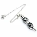 Macro view of a dowsing pendulum featuring dark grey spheres and a silver cone tip - Hematite