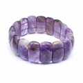 Macro detail of natural faceted amethyst gemstone bracelet with rich purple patterns - Amethyst