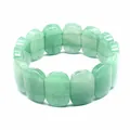Detailed view of a green natural Indian Agate stone beaded bracelet with oval beads - Aventurine Jade