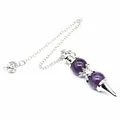 Detail shot of a natural amethyst crystal pendulum featuring 12mm beads and silver chain - Amethyst