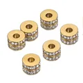 Dettaglio di perle distanziatrici in acciaio placcato oro 18k con cristalli chiari - 7mm / Oro