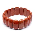 Detailed view of natural red jasper stretch bracelet featuring polished rectangular beads - Red Jasper