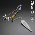 Hexagonal cone clear quartz crystal pendulum with seven chakra beads on black background - White Crystal