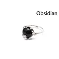 Élégante bague argentée avec une grande pierre d'obsidienne noire polie et cristaux. - Obsidienne