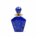 Macro view of faceted lapis lazuli perfume bottle pendant with gold accents - Lapis Lazuli