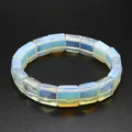 Macro detail of translucent faceted square crystal beads in a beaded bracelet - Opal