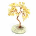 Handcrafted yellow crystal tree on a circular light green calcite stone base - Citrine