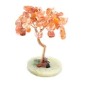 Detailed macro view of a handmade chakra crystal tree with carnelian leaves on a calcite base - Red Agate
