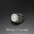 Elegant silver-tone adjustable ring featuring a round white crystal with micro-pave accents. - White Crystal
