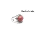 Elegant adjustable silver-tone ring featuring a round pink rhodochrosite gemstone - Rhodonite