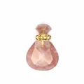 Close-up detail of a faceted strawberry quartz waterdrop essential oil diffuser pendant - Strawberry Quartz / Gold Accessories