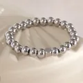Pulsera unisex de cuentas de acero inoxidable plateado con detalle cuadrado, elegante - Plateado