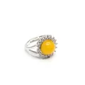 Adjustable silver-tone cocktail ring featuring a round yellow topaz center and zircon halo - Topaz