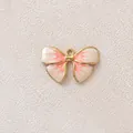 Vergoldeter Emaille-Schleifenanhänger in Pink und Creme für DIY-Schmuckherstellung - Orange Farbverlauf Schleife