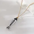 Elegant stainless steel gold chain with a chic black and white enamel fishbone pendant - Black (NAF08-8)