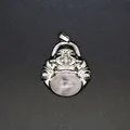 Elegant silver-tone laughing Buddha pendant necklace with a natural rose quartz gemstone - Rose Quartz