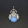 Traditional silver Laughing Buddha Maitreya pendant with oval blue opal gemstone - Opal