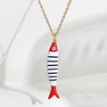 Dainty gold chain necklace featuring a red and white striped fish enamel pendant - Red Black White Striped