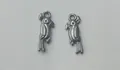 Detailed view of two silver stainless steel parrot pendants for DIY jewelry making. - 18.5x7.1x2.05mm