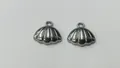 Detailed macro shot of stainless steel shell charms for DIY jewelry making. - 12.9x13.4x3.6mm