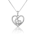 Close-up of heart-shaped pendant necklace featuring shimmering zircons and bird details - Rooster