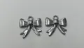 Zilveren strikbedeltjes van roestvrij staal voor DIY-sieraden maken en accessoires - 19x18.05x2.78mm (Gat 2.8mm)
