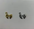 Roestvrijstalen strikjes hangers in goud en zilver voor handgemaakte DIY sieraden. - 14.61x13.34x2.31mm (Gat 2.22mm)