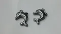 Zwei silberfarbene Delfin-Anhänger aus Edelstahl für DIY-Halsketten- und Armband-Bastelarbeiten. - 24.3*15.1*4.5mm