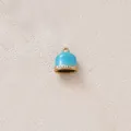 Detail view of a blue enamel bell pendant with gold plating and sparkling rhinestones. - Blue Bells with Rhinestones