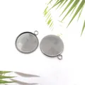 Detailed view of two stainless steel round pendant base bezel trays for DIY jewelry - 20mm Inner Diameter Single Pendant