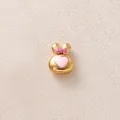 Gros plan d'une perle de lapin dorée avec nœud rose et cœur pour créations de bijoux DIY. - Lapin Rose