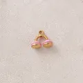 Close-up of pink enamel gold-plated stainless steel phone-shaped charm pendant - Pink Phone