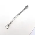Detail van 7cm roestvrijstalen verlengketting met sluiting en gegraveerd hartje - Hart Stijl (DN04-1) / 70mm Verpakking
