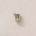 Close-up detail of a gold-plated stainless steel hourglass charm with blue enamel - Hourglass / Blue Hourglass