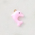 Macro detail of a pink oil-dripping dolphin pendant with a gold-plated jump ring accessory - Pink Dolphin