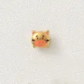 Close-up view of a gold-plated pig bead with pink enamel for DIY jewelry making - Pink Eared Pig (Style 1)