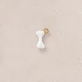 Detailed view of white bone-shaped charm with gold-plated ring for DIY jewelry making projects - Bone / White Bone
